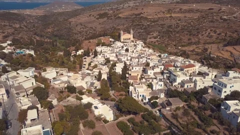 Aerial drone perspective over white traditional greek village with iconic c.. Vídeo Stock 337621825