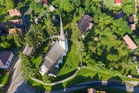 Aerial drone point of view of a whitewashed protestant church Stock Photos
