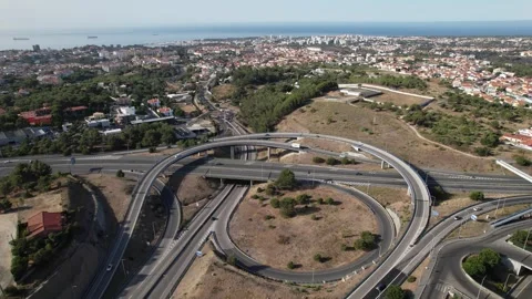 Aerial drone POV tracking of A5 highway in Cascais, Portugal Stock Footage 248710577
