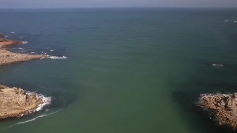 Aerial drone POV view exiting the bay at Sao Martinho do Porto, Portugal Stock Footage 246737811