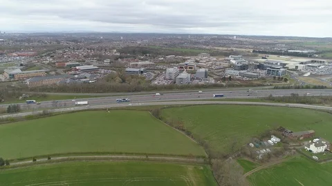 Aerial Drone pull away from M1 motorway, Yorkshire Stock Footage 105744803