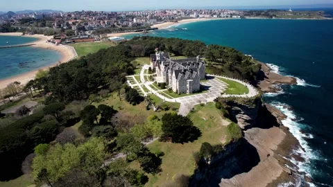 Aerial drone pull away from Magdalena Palace in Santander, Cantabria, Spanish Stock Footage 237894400