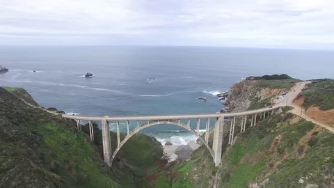 Aerial Drone Pull Back Over Bixby Bridge and Ocean In Big Sur California Stock Footage 84038771