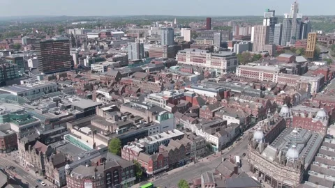 Aerial drone pull back over Leeds city centre train Video stock 130326823