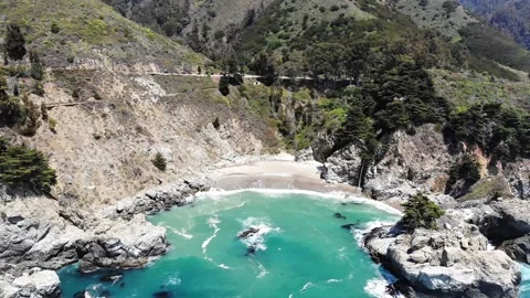 Aerial Drone Pull Back Over McWay Cove and Big Sur Coastline, California, 4K Stock Footage 336424806