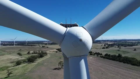 Aerial Drone Pull Back from Wind Turbine Stock Footage 332749977