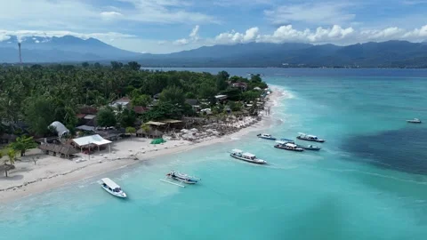 Aerial Drone Pullback From Gili Air Beach Revealing Mount Lombok Volcano Stock-Footage 330977996