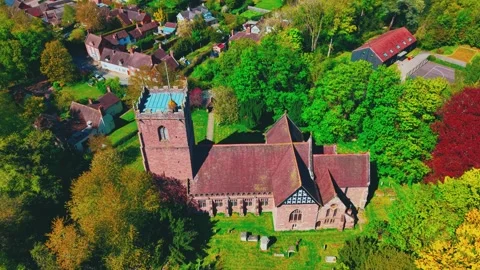 Aerial Drone Pullback from Medieval Church Revealing Condover Village and Stock Footage 334136130