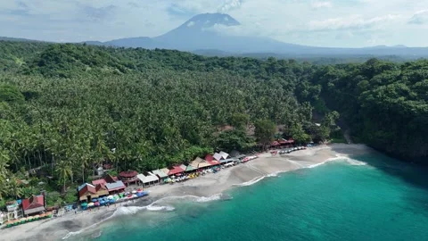 Aerial Drone Pullback Over Virgin Beach Revealing Mount Agung Volcano Bali Stock-Footage 330978260
