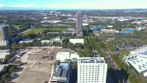 Aerial drone pullback reverse view over Sydney Olympic Park, NSW Stock Footage 200951120