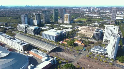 Aerial drone pullback reverse view over Sydney Olympic Park, NSW 스톡 동영상 200951267