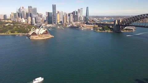 Aerial drone pullback reverse view of Sydney City, NSW looking over Kirribilli Stock Footage 241694183