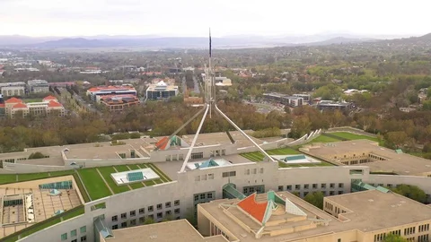 Aerial drone pullback shot of the Australian Parliament House in Canberra Video stock 124730598