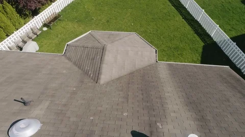 Aerial Drone of a Residential Roof Inspection with Hail Damage Markings Stock Footage