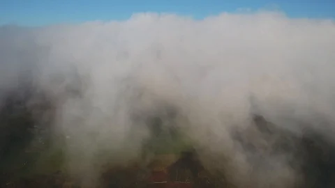 Aerial drone retreating cloud from static position above rural Yorkshire Video stock 124498378