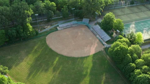 Aerial Drone Reveal of Empty Baseball Field in Park in Plateau Montreal, Quebec Stock Footage 155887739