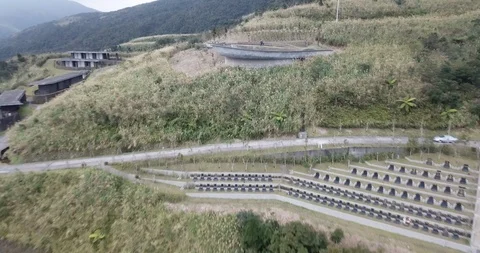 Aerial Drone Reverse - Jiang Wei Water Hill Cemetery Taiwan 스톡 동영상 124913742