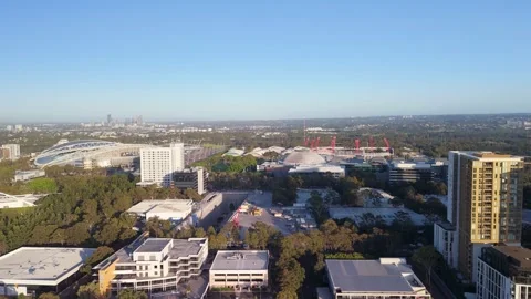 Aerial drone reverse  view of Sydney Olympic Park in Sydney NSW Australia Stock Footage 296032920