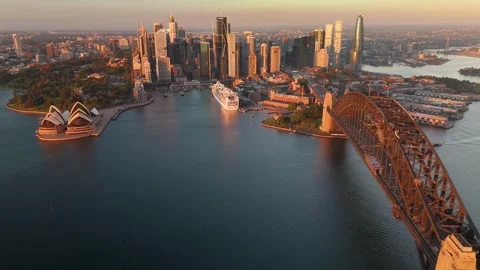 Aerial drone reverse view of Sydney City from above Sydney Harbour, NSW Stock Footage 334587627