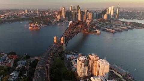 Aerial drone reverse view of Sydney City from above Sydney Harbour, NSW Stock Footage 334587703