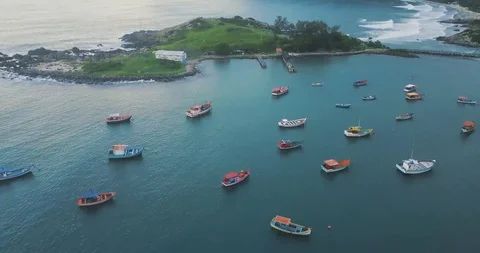 Aerial Drone Rising Over Static Fishing Boats on Beach in Brazil, Frolianopolis Vídeo Stock 101554226