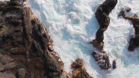 Aerial Drone Rising Over Waves Crashing on Lava Coast, Tenerife, Canary Islands Stock Footage 336279720