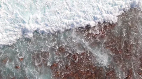 Aerial Drone Rising Over Waves Crashing on Lava Coast, Tenerife, Canary Islands Vidéo 336280305