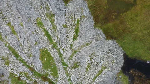 Aerial Drone of River Flowing Through Slate House Ruins Stock Footage 161899143