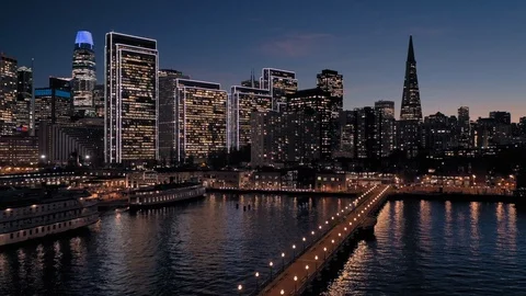 Aerial Drone Of The San Francisco City Skyline and pier at sunset Stock Footage