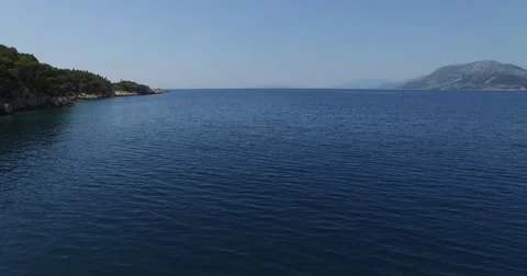 Aerial drone scene going fast, quickly by a croatian coastline. 스톡 동영상 52336433
