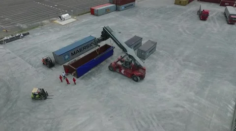Aerial drone scene while workers are preparing a shipping, crane and container Vídeo Stock 59941590