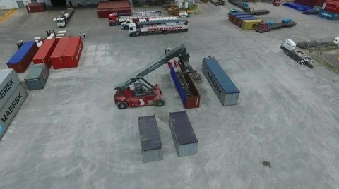 Aerial drone scene while workers are preparing a shipping, crane and container Vídeo Stock 59957429