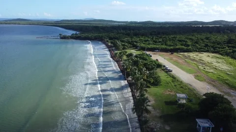 Aerial Drone Shot Advancing Between  on Empty Beach in the Caribbean Stock Footage 273835233