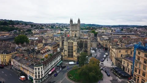 Aerial drone shot of Bath Abbey and city centre traffic Bath England Stock Footage 331454161
