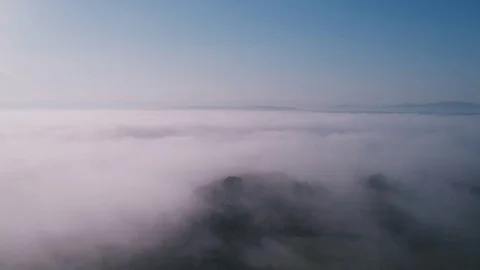 Aerial Drone Shot Of Beautiful Clouds Covering Fields Against Sky Stock Footage 79654552
