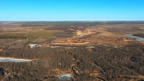 Aerial drone shot of brown tree forests landscape in Autumn with river. Russia Stock Footage 105951289
