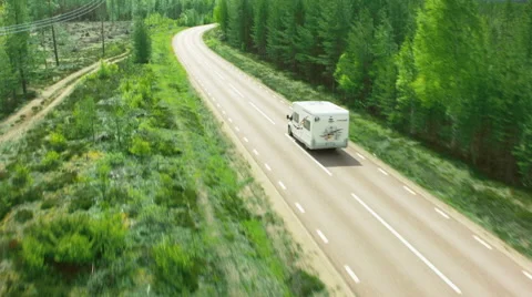Aerial drone shot of a camper in forest Stock Footage