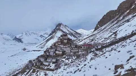 Aerial drone shot capturing the breathtaking view of Key Monastery blanketed in Stock Footage 304943236
