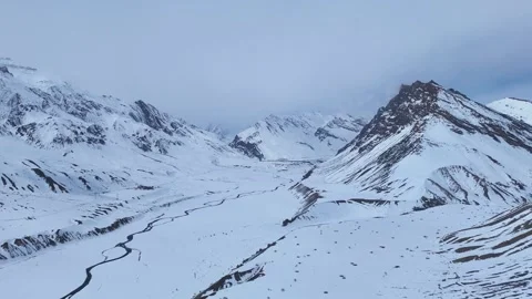 Aerial drone shot capturing the breathtaking winter landscape of Spiti Valley, Stock Footage 304943337