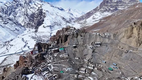 Aerial drone shot capturing the breathtaking view of Dhankar Monastery perched Stock-Footage 304945559