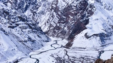 Aerial drone shot capturing the breathtaking winter landscape of Spiti, where Stock Footage 304947241