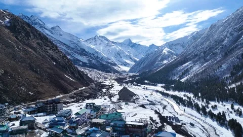 Aerial drone shot capturing the breathtaking beauty of Chitkul blanketed in Stock Footage 304947312