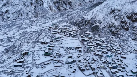 Aerial drone shot capturing a breathtaking view of an entire city blanketed in Stock Footage 304948696