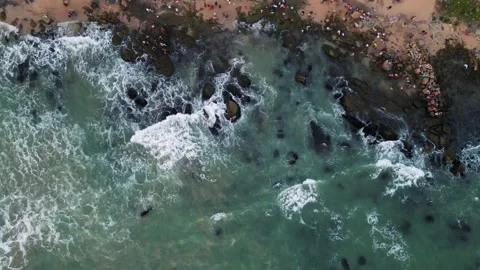Aerial drone shot capturing the charm of Kanyakumari's city lights and ocean Stock Footage 297594434