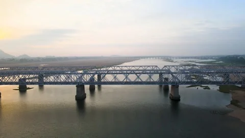 Aerial drone shot capturing the essence of Vijayawada in the early morning, with Stock Footage 297597773