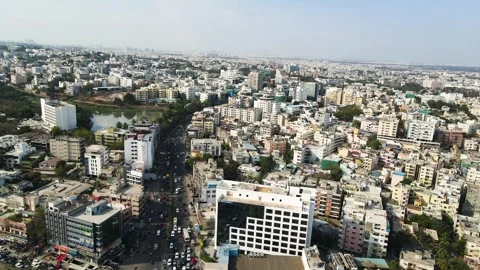 Aerial drone shot capturing the essence of Hyderabad’s city life, with packed Stock Footage 305837852