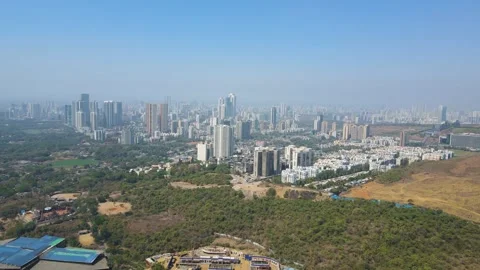 Aerial drone shot capturing the expansive Mumbai cityscape, showcasing a blend Stock Footage 305837065