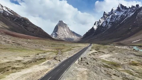 Aerial drone shot capturing the remote and rugged landscape surrounding Gumbok Stock-Footage 310750970