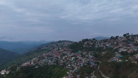 Aerial drone shot capturing the scenic town of Almora, nestled in the Kumaon Vídeos de archivo 310748643