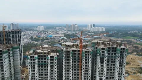 Aerial drone shot capturing a sprawling under-construction building near Dwarka Stock Footage 305835036